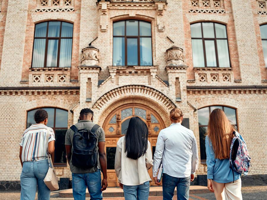Students Walking into Building