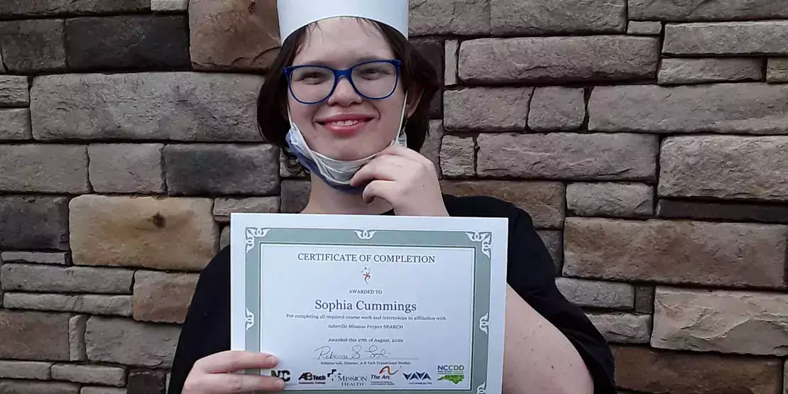 Sophia Cummings with a certificate