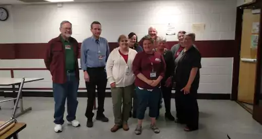 A group of A-B Tech employees at Owen Middle School
