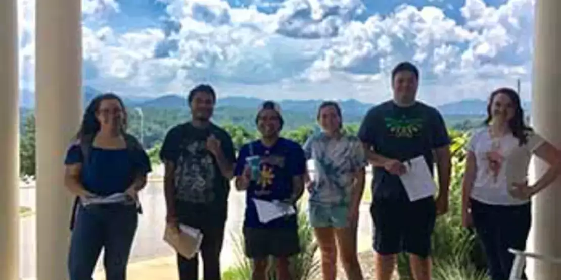 Six math students standing on the Fenihurst porch.