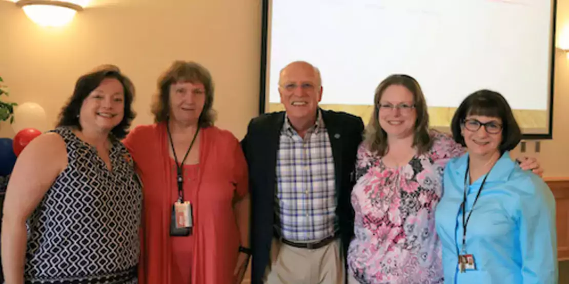 Pictured are RISE nominees Becky Watkins, Sarah Benson, Dana Moore and Cathy Strohm-Horton with President Dennis King.